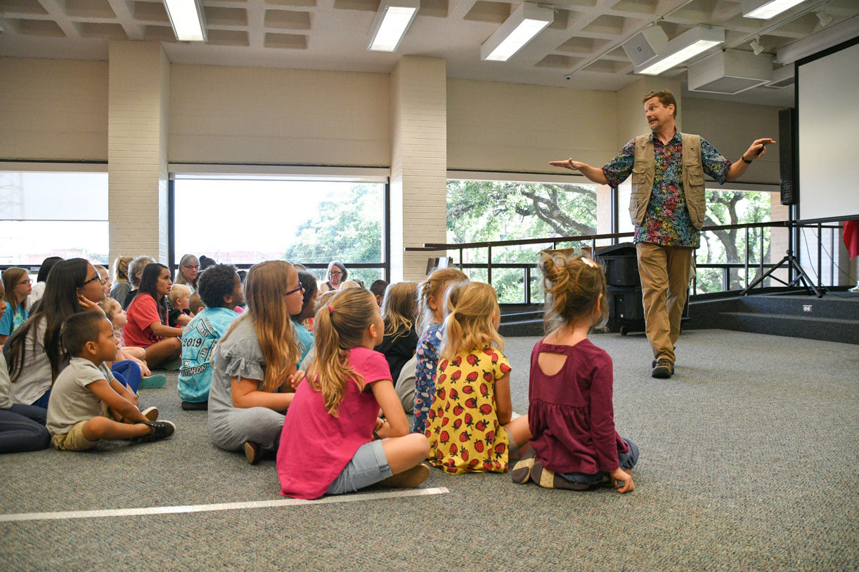 Singing zoologist Lucas Miller visits Bryan library